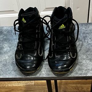 Adidas black hi tops with yellow thread trim